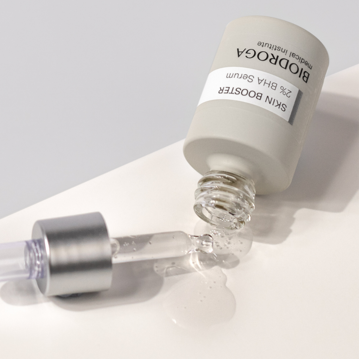 Grafisches Gestaltungselement BIODROGA Skin Booster 2% BHA Serum